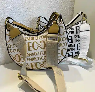 Zwei Enrico-Taschen, eine weiße und eine schwarze, mit der Aufschrift „Eco“.