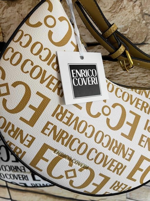 Eine Tasche mit einem Etikett darauf, auf dem „Enrico Tasche Cover“ steht.