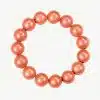 Entdecke die Traumperlen: Einzigartig, stilvoll und absolut im Trend! Stell dir ein rundes Armband aus strahlend orangefarbenen, glänzenden Perlen vor, das auf einem schlichten weißen Hintergrund präsentiert wird. Die Perlen sind perfekt, gleichmäßig angeordnet und bilden einen makellosen Kreis. Es ist nicht nur Schmuck, sondern eine Aussage – bereit für dein Handgelenk? Erlebe den perfekten Mix aus Eleganz und Modernität mit den Traumperlen!.