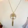 Erlebe mit der goldenen Lebensbaum Kette mit funkelnden Steinen und Quaste pure Eleganz - das Highlight für deinen Style!.