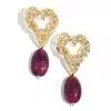 Entdecke die Heart Glow Statement Ohrstecker: Goldfarben, modern strukturiert und mit violettem Stein - dein elegantes Must-have!.