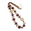 Verleihe deinem Look mit der Golden Jungle Statementkette einen Hauch Wildnis - goldene, braune und Animal-Print-Perlen!.