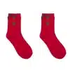 Mit den XMAS Star Glam Socks bringst du weihnachtlichen Glanz an deine Füße - rote Socken mit grünen und goldenen Sternen!.