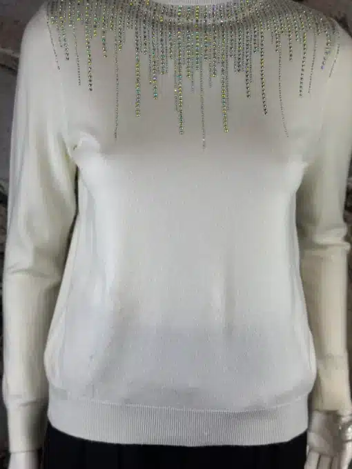 Setze ein Statement mit dem Sparkle Line Turtleneck - lange Ärmel und funkelnde Perlenfransen lassen dich modern glänzen.