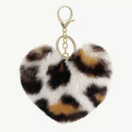 Verleihe deinem Look das gewisse Etwas: Herzförmiger Anhänger mit Leo-Print und goldenem Karabiner für deinen Schlüssel oder deine Tasche.
