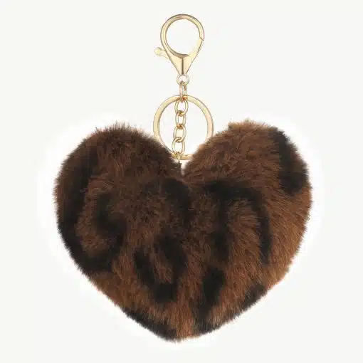 Verleihe deinem Look das gewisse Etwas: Der Plüsch-Liebes-Schlüsselanhänger in Braun und Schwarz mit goldenem Ring verzaubert dich!.
