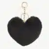 Verleihe deinem Style das gewisse Etwas - mit diesem flauschigen, schwarzen Herz-Anhänger und edlem Goldverschluss!.