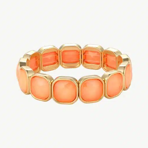 Erlebe modernen Luxus: Trage dieses goldene Armband mit leuchtend orangen Steinen und setze ein stylishes Statement!.