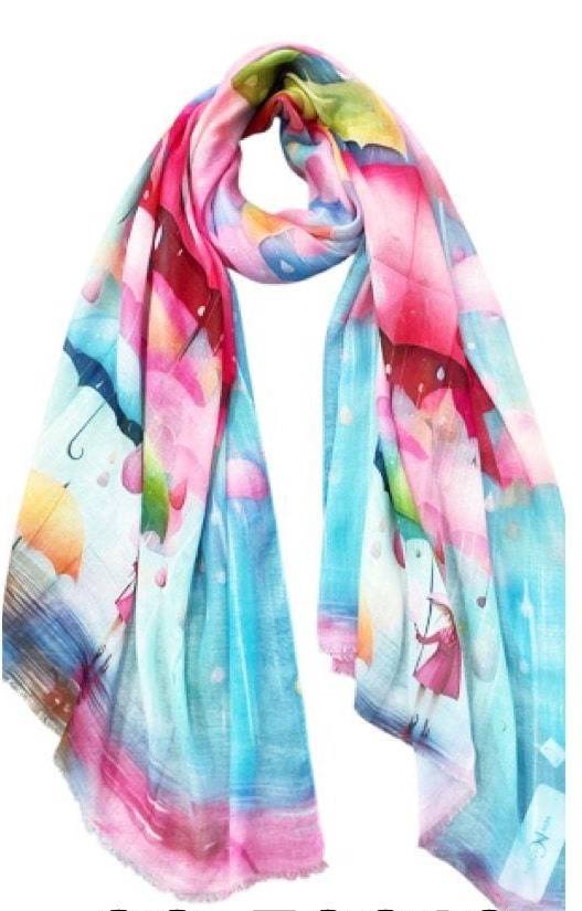 „Umbrella Dream“ Schal: Bunter Schal mit Regenschirm-Muster in Rosa, Blau und Gelb. Ein modisches Accessoire für jeden Anlass.